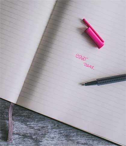 Journal with the phrase: Start today, written inside